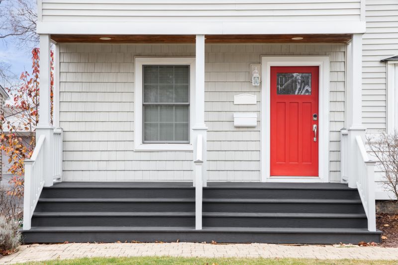 Home with vibrant front door and shutters
